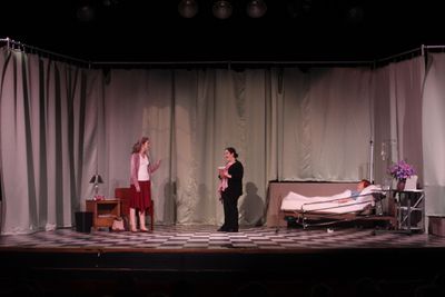 Neutral-lit hospital room scene from Dear Mom