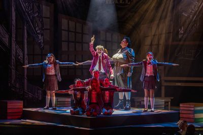 Cool blue-lit stage moment from Matilda